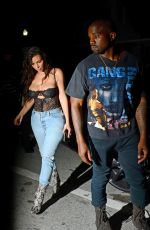 KIM KARDASHIAN in Ripped Jeans Out in Miami 09/15/2016