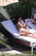 KOURTNEY KARDASHIAN in Swimsuit at a Pool in Miami 09/15/2016