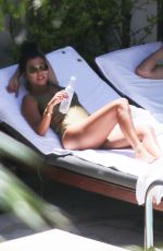 KOURTNEY KARDASHIAN in Swimsuit at a Pool in Miami 09/15/2016