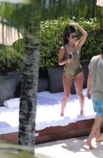 KOURTNEY KARDASHIAN in Swimsuit at a Pool in Miami 09/15/2016