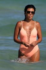 KOURTNEY KARDASHIAN in Swimsuit oat a Beach in Miami 09/17/2016