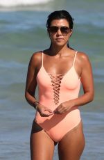 KOURTNEY KARDASHIAN in Swimsuit oat a Beach in Miami 09/17/2016