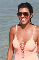 KOURTNEY KARDASHIAN in Swimsuit oat a Beach in Miami 09/17/2016