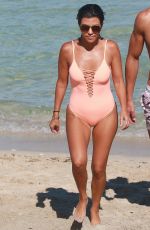 KOURTNEY KARDASHIAN in Swimsuit oat a Beach in Miami 09/17/2016
