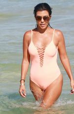 KOURTNEY KARDASHIAN in Swimsuit oat a Beach in Miami 09/17/2016