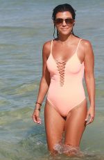 KOURTNEY KARDASHIAN in Swimsuit oat a Beach in Miami 09/17/2016