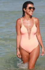 KOURTNEY KARDASHIAN in Swimsuit oat a Beach in Miami 09/17/2016