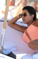 KOURTNEY KARDASHIAN in Swimsuit oat a Beach in Miami 09/17/2016