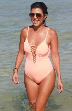 KOURTNEY KARDASHIAN in Swimsuit oat a Beach in Miami 09/17/2016