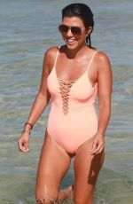KOURTNEY KARDASHIAN in Swimsuit oat a Beach in Miami 09/17/2016