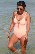 KOURTNEY KARDASHIAN in Swimsuit oat a Beach in Miami 09/17/2016