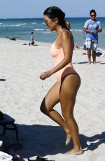 KOURTNEY KARDASHIAN in Swimsuit oat a Beach in Miami 09/17/2016