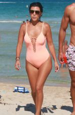 KOURTNEY KARDASHIAN in Swimsuit oat a Beach in Miami 09/17/2016