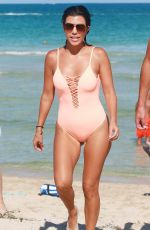 KOURTNEY KARDASHIAN in Swimsuit oat a Beach in Miami 09/17/2016