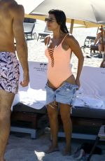 KOURTNEY KARDASHIAN in Swimsuit oat a Beach in Miami 09/17/2016