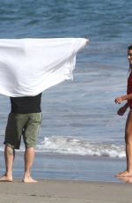 LEA MICHELE in Swimsuit on the Set of a Photoshoot on the Beach in Malibu 09/01/2016