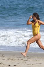 LEA MICHELE in Swimsuit on the Set of a Photoshoot on the Beach in Malibu 09/01/2016