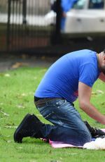 LOUISE CLIFFE with Her Dog at a Park in Manchester 09/14/2016