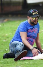 LOUISE CLIFFE with Her Dog at a Park in Manchester 09/14/2016
