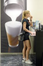 MICHELLE HUNZIKER Shopping at Media World in Milan 09/04/2016