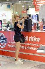 MICHELLE HUNZIKER Shopping at Media World in Milan 09/04/2016