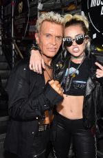 MILEY CYRUS Performs with Billy Idol at 2016 IhearRradio Music Festival in Las Vegas 09/23/2016