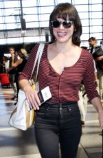 MILLA JOVOVICH at Los Angeles International Airport 09/28/2016