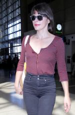 MILLA JOVOVICH at Los Angeles International Airport 09/28/2016