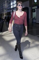 MILLA JOVOVICH at Los Angeles International Airport 09/28/2016