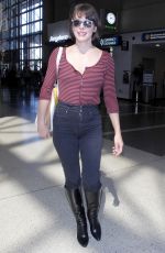 MILLA JOVOVICH at Los Angeles International Airport 09/28/2016