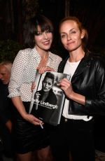 MILLA JOVOVICH at Peter Lindbergh Book Signing in Los Angeles 09/20/2016