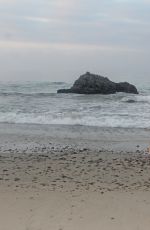 SARA BARRETT in Bikini at a Beach in Malibu 09/04/2016