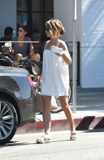 SARAH HYLAND in a White Mini Dress Out in Los Angeles 09/17/2016
