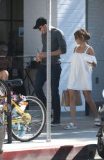 SARAH HYLAND in a White Mini Dress Out in Los Angeles 09/17/2016