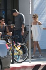 SARAH HYLAND in a White Mini Dress Out in Los Angeles 09/17/2016