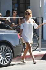 SARAH HYLAND in a White Mini Dress Out in Los Angeles 09/17/2016