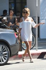 SARAH HYLAND in a White Mini Dress Out in Los Angeles 09/17/2016