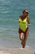 VICKY XIPOLITAKIS in Yellow Swimsuit at a Beach in Miami 09/21/2016