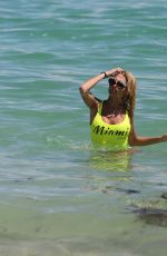 VICKY XIPOLITAKIS in Yellow Swimsuit at a Beach in Miami 09/21/2016