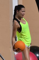 ADRIANA LIMA on the Set of Victoria