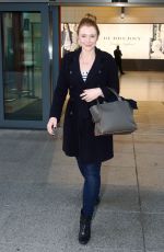 BRYCE DALLAS HOWARD at Heathrow Airport in London 10/05/2016