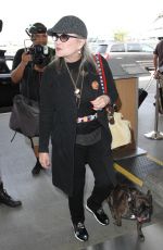 CARRIE FISHER at LAX Airport in Los Angeles 10/07/2016