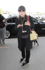 CARRIE FISHER at LAX Airport in Los Angeles 10/07/2016