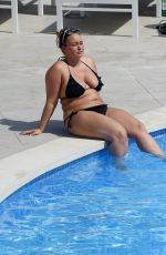 CHANELLE HAYES in Bikini at a Pool in Spain 10/04/2016