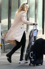 DAKOTA FANNING Leaves Her Hotel in New York 10/12/2016