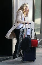 DAKOTA FANNING Leaves Her Hotel in New York 10/12/2016
