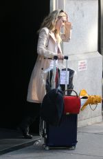 DAKOTA FANNING Leaves Her Hotel in New York 10/12/2016