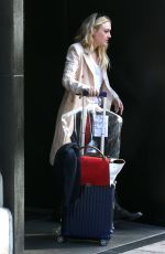 DAKOTA FANNING Leaves Her Hotel in New York 10/12/2016