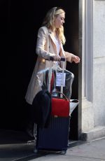 DAKOTA FANNING Leaves Her Hotel in New York 10/12/2016