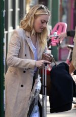 DAKOTA FANNING Leaves Her Hotel in New York 10/12/2016